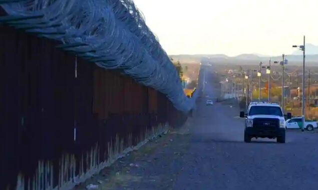 Woman dies after attempting to scale US border wall