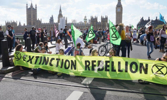 Climate activists block four of London’s busiest bridges