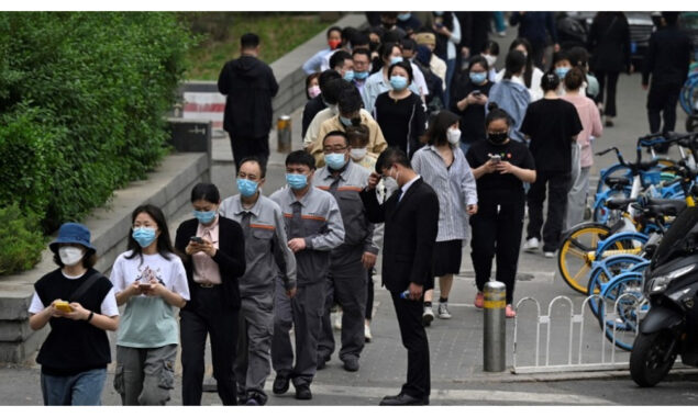 Beijing Covid spike prompts mass testing, panic buying