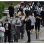 Beijing Covid spike prompts mass testing, panic buying