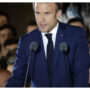 After winning the election, Macron promises to address “doubts and divisions.”