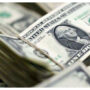 Eurozone stocks wobble, euro hits 5-year dollar low
