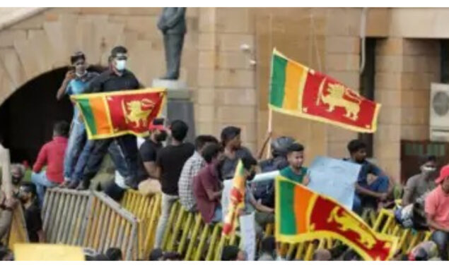 Sri Lanka leader trims cabinet of relatives ahead of IMF talks