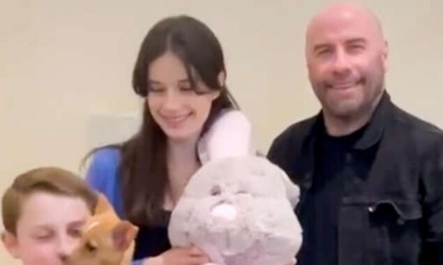 John Travolta celebrates Easter with his family and and new pup