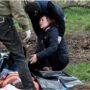 CORRECTED: On the trail of the dead in a Ukrainian village
