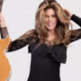 Shania Twain poses in stunning black dress to rally fan support ahead of CMT Awards
