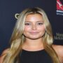 Fans were perplexed to see Holly Valance of Neighbours at Donald Trump’s dinner party.