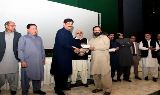 Murad distributes Rs445.19m compensation among 358 fire affected shopkeepers of Cooperative & Victoria markets