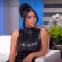 During an interview with Ellen DeGeneres, Kim Kardashian SCREAMS and rushes off stage in a short latex dress