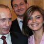 In a suspected effort to evade penalties, the name and photo of Putin’s ‘girlfriend’ have been erased from the website of the media empire she runs