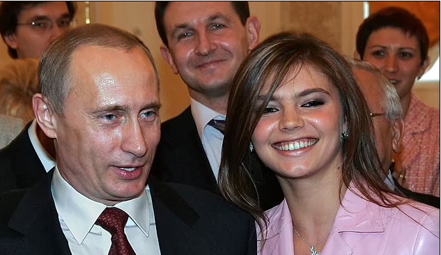 In a suspected effort to evade penalties, the name and photo of Putin’s ‘girlfriend’ have been erased from the website of the media empire she runs