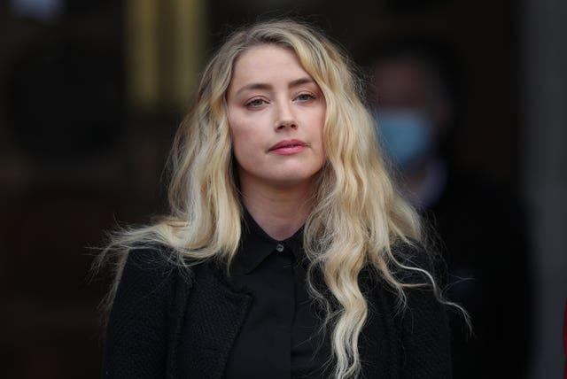 Amber Heard's 'Aquaman' role cut to 10 minutes due to a lawsuit