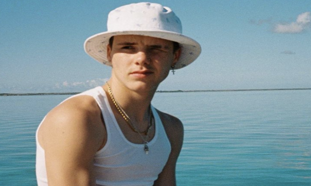 Cruz Beckham has signed a deal with Dua Lipa’s label to start his music career