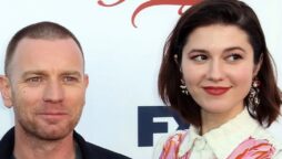 On their first trip together after marrying, Ewan McGregor and Mary Elizabeth put on a PDA-packed show