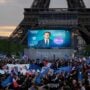 supporters enjoy victory of Emmanuel Macron under Eiffel Tower