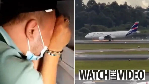 HORRIFIC MOMENT: Sobbing passengers pray as they brace for an emergency landing that sends sparks shooting from the plane