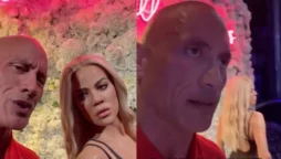 Dwayne Johnson fanning her back, and Khloe Kardashian’s response