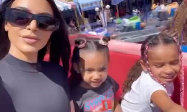 During a trip to Disneyland, Kim Kardashian and her sister Khloe cause a stir for bypassing lines