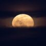 A dazzling pink moon rises to set the stage for a blood moon and a solar eclipse