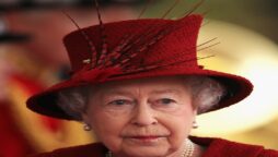 Queen Elizabeth is suffering from a ‘severe headache’ thanks to Prince Harry