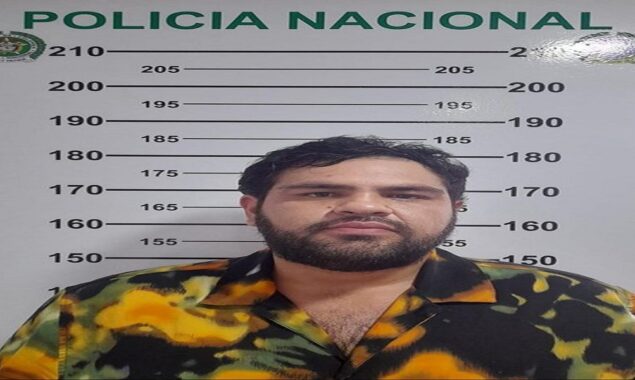 He was arrested after a model girlfriend posted a picture on Facebook.