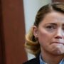 Experts say Amber Heard’s memes are a “slap in the face” to all domestic abuse victims