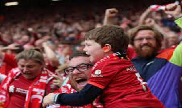 ‘It’s amazing, Dad!’: the Liverpool fans who loaned their passes to their children