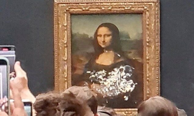 Man arrested after smearing Mona Lisa with cake at Louvre