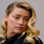 Amber Heard trolled for taking imaginary notes during the trial