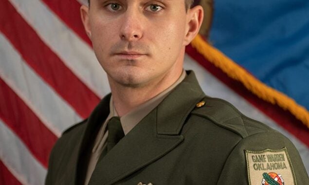An Oklahoma game warden was hailed as a hero after rescuing a man who dragged in water vortex