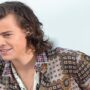 Harry Styles apologises after singing about drugs and breasts in front of his mother