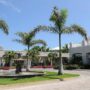 An American woman who became ill at a Bahamas resort is now hospitalized in Miami
