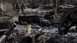 Ukrainian authorities are looking into the deaths of citizens discovered buried beside a highway