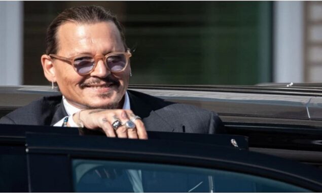 Johnny Depp is greeted like rock hero, with audiences chanting “Innocent!” at Scottish concert