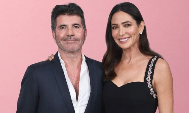 Lauren Silverman and Simon Cowell are seen holding hands in a romantic PDA photo