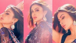 Mouni Roy looks like a classic bombshell in this shimmery saree