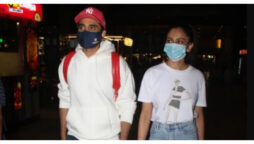 Rakul Preet Singh and Jackky Bhagnani are twins in white as they pose for photos at the airport.