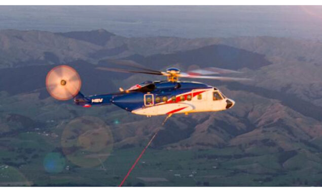 The Rocket Lab helicopter collects and drops a rocket booster.