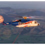 The Rocket Lab helicopter collects and drops a rocket booster.
