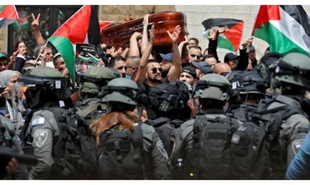 Jerusalem archbishop condemns police raid at journalist’s funeral