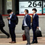 Asian markets drop after Wall St battering