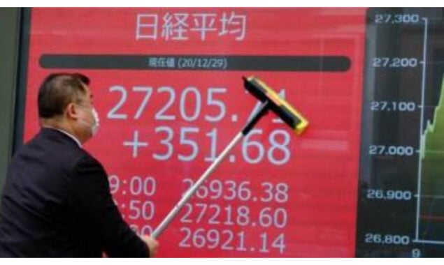 Tokyo shares close higher