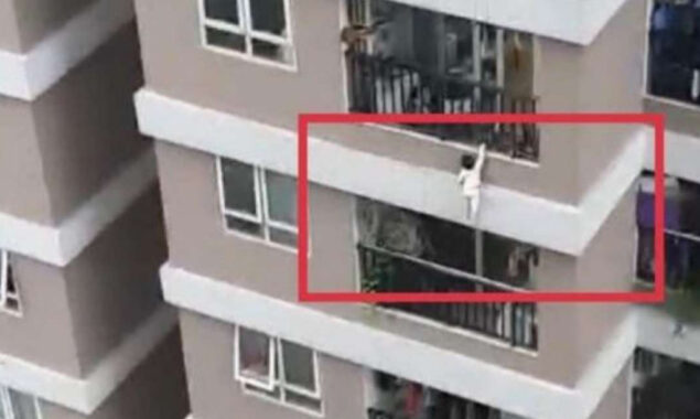 Watch: A man puts his life at risk to save a toddler from falling 100 feet