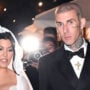 Travis Barker and Kourtney Kardashian enjoy their first wedding dance