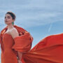 Deepika Padukone brings regal finesse & some skin in an orange gown