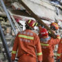 Eighth survivor recovered from China building collapse site as rescue hopes dim