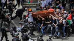 Israeli police beat mourners