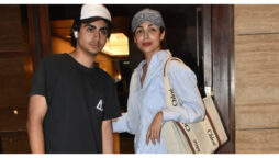 Malaika Arora twins with her son Arhaan Khan, and both wear elegant headgear on their outings.