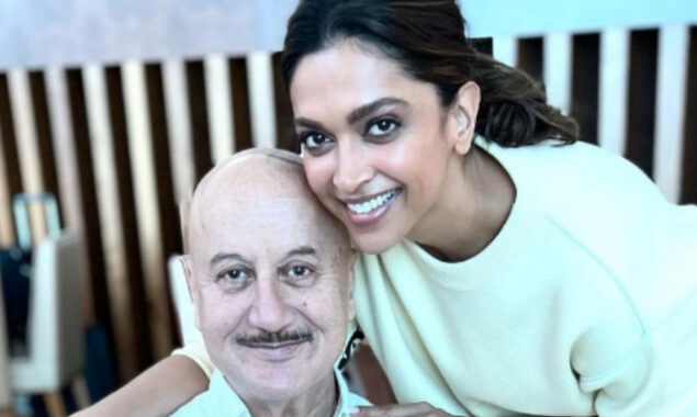 Anupam Kher poses with gorgeous Deepika Padukone at the airport