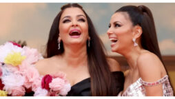 Aishwarya Rai Bachchan and Eva Longoria enjoy a candid moment on the red carpet at Cannes 2022.